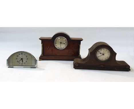 A comet 8 day alarm clock,&nbsp;two mantle clocks and two wooden mounted mantle clocks, one an Elliott clock, the largest man