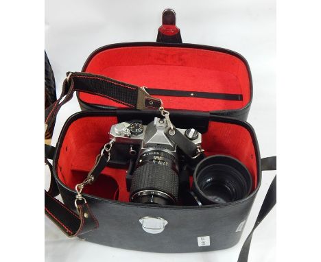 Two Pentax ME super cameras, a Pentax MX camera, various lenses and pairs of binoculars  