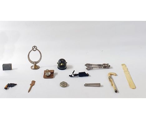 A box of assorted items, to include compasses, sewing box, button hooks, a nutcracker, an Art Deco style beaded brooch, magni