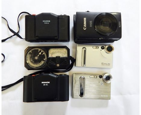 Two Mamiya lenses (one with case), a Minox 35 GL camera, a Kneb 35A camera, a Weston model 650 photronic exposure meter, a Ca