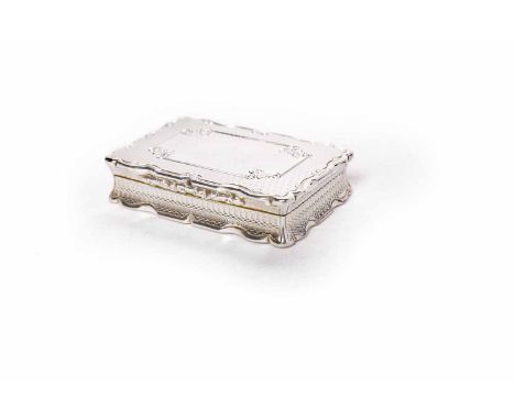 VICTORIAN SILVER SNUFF BOXmaker Yapp & Woodward, Birmingham 1853, of rectangular serpentine outline, with engine turned decor