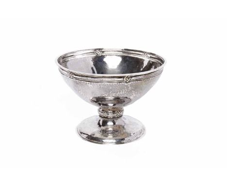 GEORGE V HAMMERED SILVER PEDESTAL BOWLmaker Albert Edward Jones, Birmingham 1915, with Celtic knot and band design to rim and