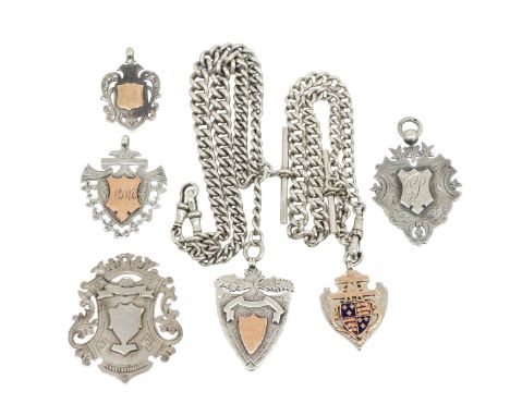 Sporting: A collection of six silver hallmarked medallions to include:&nbsp;a silver shield medallion with enamel and gold de