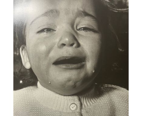 Diane Arbus (1923-1971) was an American photographer known for her compelling and often controversial portraits of people on 