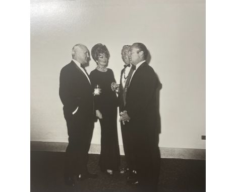 Diane Arbus (1923-1971) was an American photographer known for her compelling and often controversial portraits of people on 