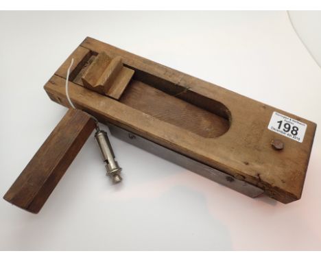 WWII Air Raid Wardens rattle stamped RCD 1944 with broad arrow and J Hudson ARP whistle 