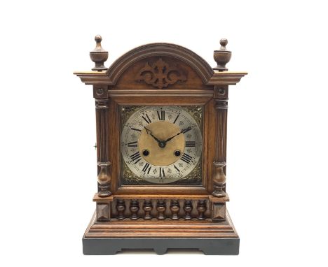 Late 19th century walnut architectural cased mantel clock, the brass dial with silvered Roman chapter ring enclosed by glazed