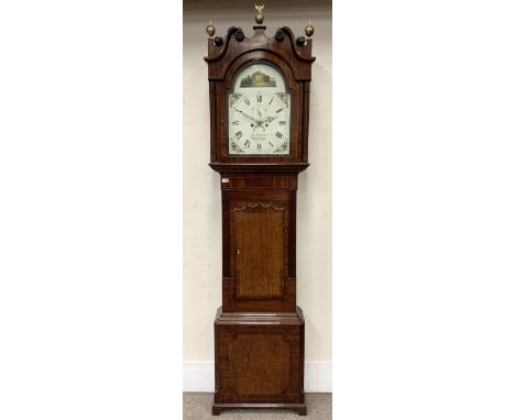 Early 19th century oak and mahogany longcase clock, the hood with scrolled pediment over stepped arch glazed door, multi-cusp