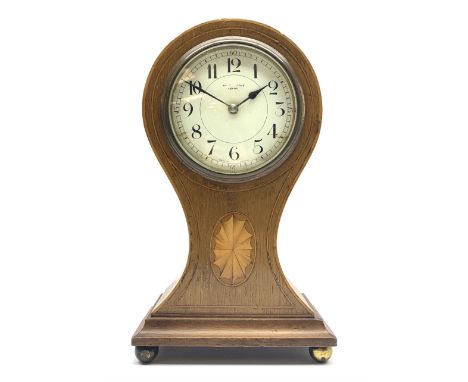 Edwardian mahogany balloon mantel clock timepiece, circular enamel Arabic dial, the front inlaid with fan motif, boxwood stri