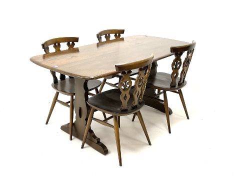 Ercol Beamish refectory rectangular dining table, two shaped supports with sledge feet, joined by moulded stretcher (L153cm, 
