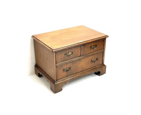 20th century walnut television stand, fall front opening as three faux drawer, enclosing fitted interior,  bracket supports D