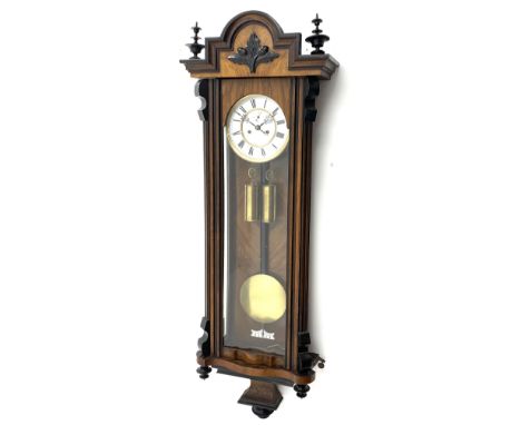 Late 19th century Vienna style wall clock in walnut and ebonised case, the stepped pediment with acorn and oak leaf carved mo