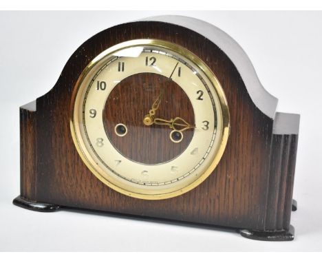A Mid 20th Century Oak Cased Mantel Clock, 29cms Wide