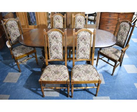 A Mid 20th Century Nathan Oak Extending Dining Table together with Six Tapestry Upholstered and Carved Chairs