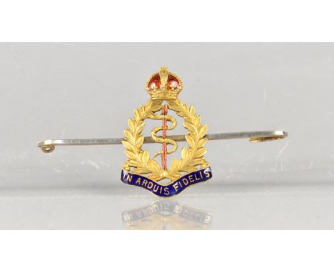 A 15ct Gold WWI Royal Army Medical Corps Sweetheart Brooch, Applied Emblem Decorated with Red and Blue Enamels, 26.1mm by 50.