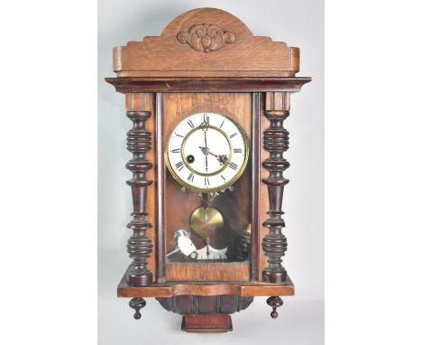 An Early 20th Century Vienna Style Wall Clock, with Pendulum and Key, the Brass and Enamel Face Having Roman Numerals, Archit