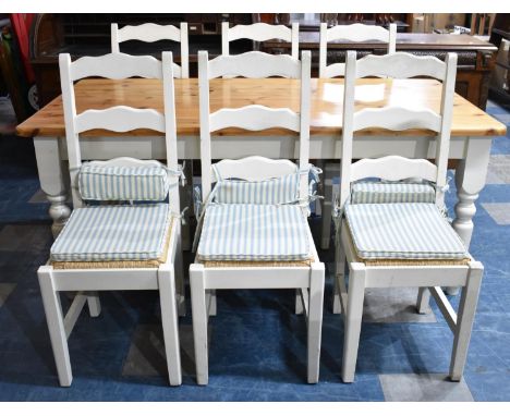 A Modern White Painted and Natural Pine Rectangular Kitchen Dining Table, 183cms by 92cms together with a Set of Six White Pa