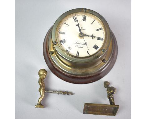 A Brass Manneken Pis Corkscrew, Indian Figure and a Wall Clock