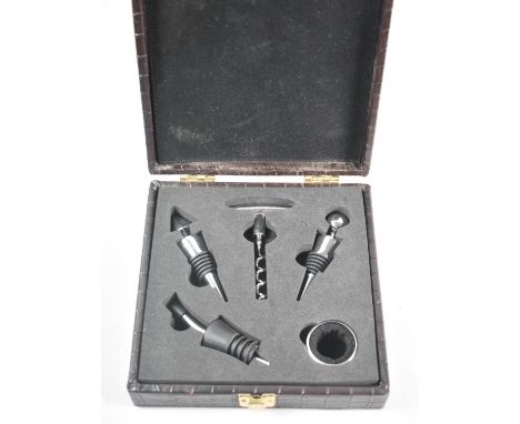 A Modern Cased Wine Set to include Corkscrew, Winesaver Corks, Pourer and Drip Ring