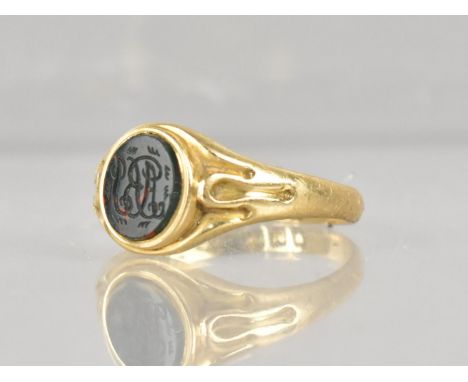 A 19th Century Signet Ring, Oval Bloodstone Panel with Seal Marked ABJ, Collet Set to Fluted Shoulders and a Plain D Shaped B