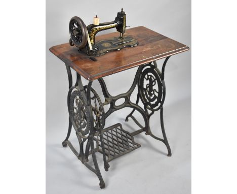 A Vintage Singer Treadle Sewing Machine Base and a Vintage Sewing Machine, 65cms Wide