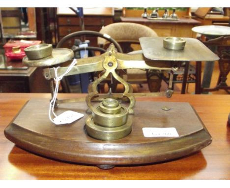 Brass and oak postal scales 