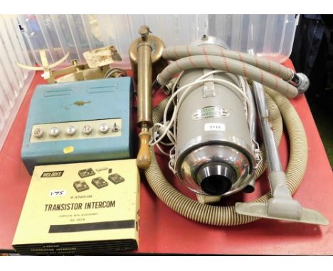 A 1950's Invincible Dudley vacuum cleaner, serial number 013271, Harper enamel scales, a Welodis four station transistor inte