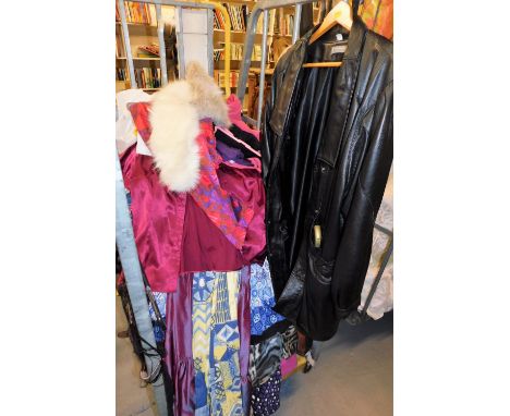 A quantity of lady's clothing, three quarter length leather jacket, silk blouse, day dresses, handbags, etc (1 cage) 