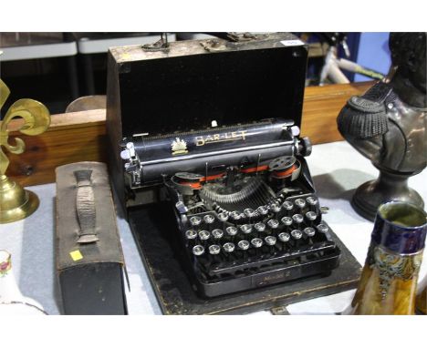 Typewriter and a set of chemistry bottles