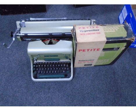 An Imperial 66 manual typewriter together with a further Petite typewriter in carry case with original box.