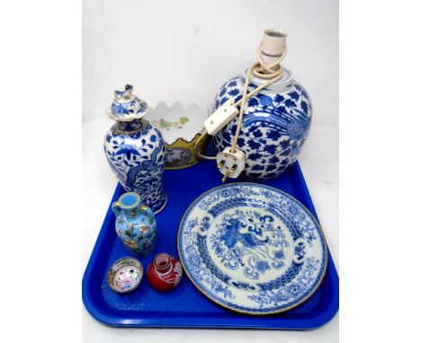 A tray containing oriental wares including blue and white plate, temple jar converted to a table lamp, tea bowl, vases etc.