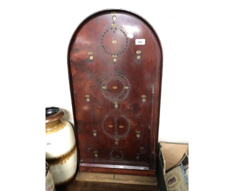 A vintage bagatelle board