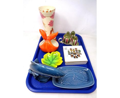 A tray containing Carlton ware trinket box, Poole pottery including a dolphin figure, Goebel china cruet.