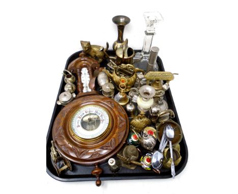 A tray containing a barometer, assorted brass ware, bells, glass candlestick, ornaments etc.
