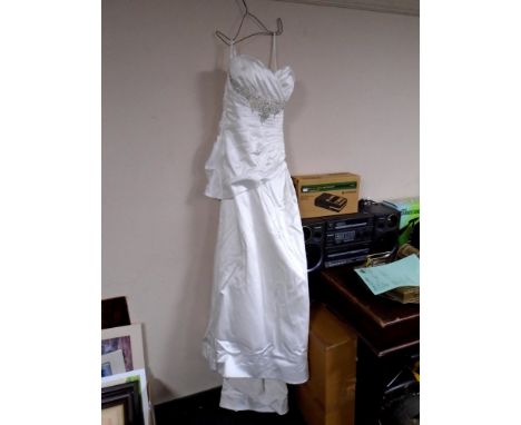 A Jade Daniels wedding dress with underskirt.