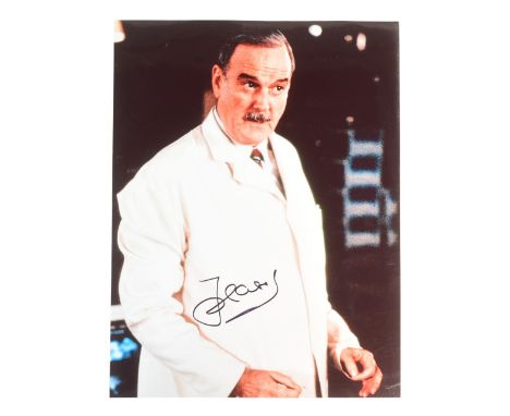 James Bond 007 - John Cleese (Q) - autographed 8x10" colour photograph from the franchise. Signed by Cleese in black ink to a