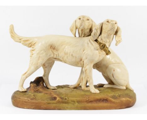 A Royal Dux Bohemia ceramic figurine, depicting two hunting dogs with khaki green collars, 23 x 31cm. Condition:Overall, the 