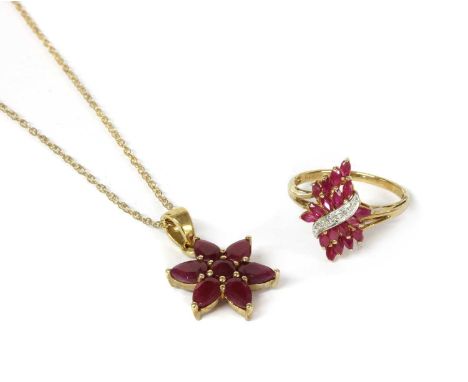 A 9ct gold fracture filled ruby set star cluster pendant, with articulated bale, suspended on a Prince-of-Wales rope link cha