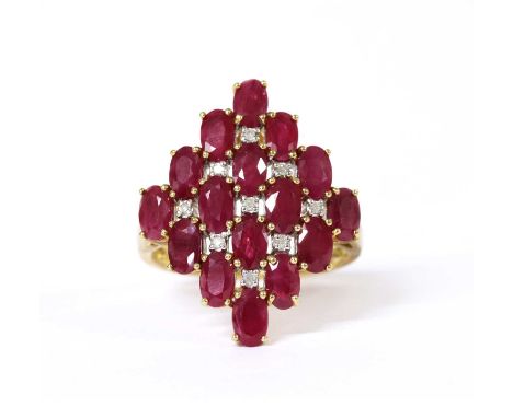 A 9ct gold ruby and diamond ring, the lozenge shaped head claw set with a lattice of oval mixed cut rubies and eight cut diam