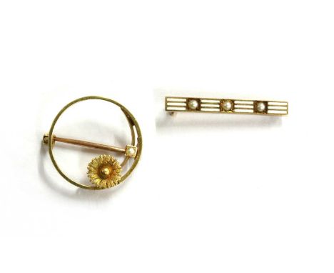 An American gold enamel and split pearl bar brooch, with pin and safety catch, tested as approximately 14ct gold, 26mm long, 