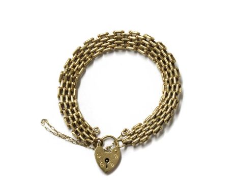 A 9ct gold gate bracelet, with heart shaped padlock clasp and safety chain, Birmingham 1992, 20.56gCondition report: Surface 