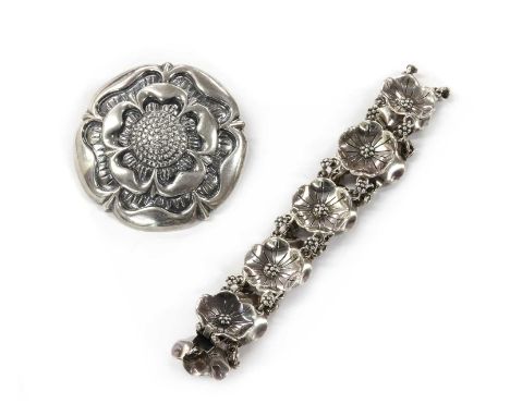 A sterling silver rose brooch, by Bernard Instone, with pin and roller catch, marked Made in England, Birmingham 1976, 39mm d