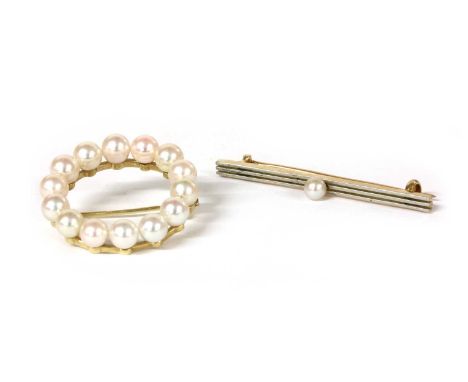 A gold cultured pearl wreath brooch, by Mikimoto, the cultured pearls 5 to 5.3mm in size, to pin and roller catch, marked 14k