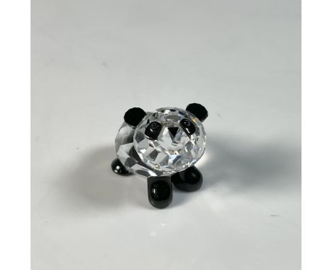 Adorable baby panda figure in a playful pose trying to stand somehow, with black accents on its ears, eyes, and legs. Swarovs