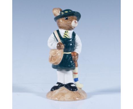A student in a dark green uniform, holding a brown bag, and stick. Royal Doulton backstamp. Artist: G. TongueIssued: 1987 - 1