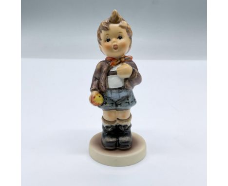 Figure of a boy holding an apple. Exclusive Edition 1992/93 M.I Hummel Club. This item has its original box measuring 5.57"L 