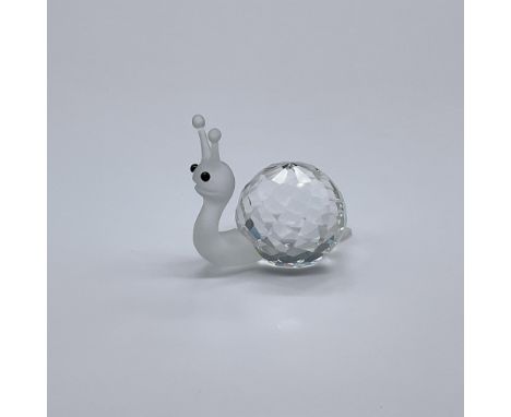 Part of the In A Summer Meadow. A snail with a clear body, black eyes, and frosted neck, head and tail. Swarovski Silver Crys