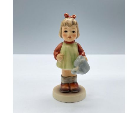Exclusive edition. Features a little girl in red and green clothes. Includes the original box, dimensions: 3''L x 3''W x 4''H