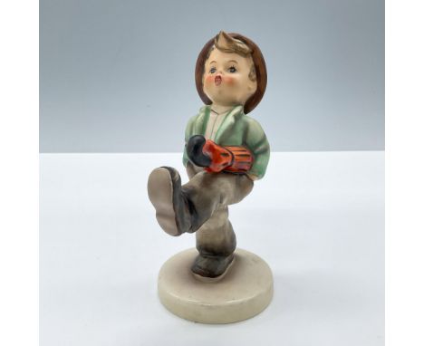 Features a happy boy, dressed in brown and green clothes with an orange umbrella. This item has its original box, dimensions: