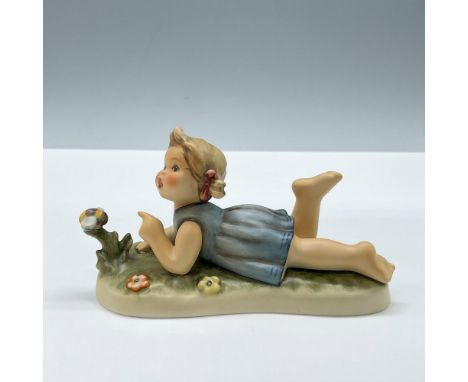Exclusive edition for the M.I Hummel club. Features a lovely girl admiring a bee. This item has its original box, dimensions: